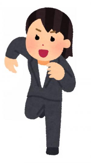 走る人